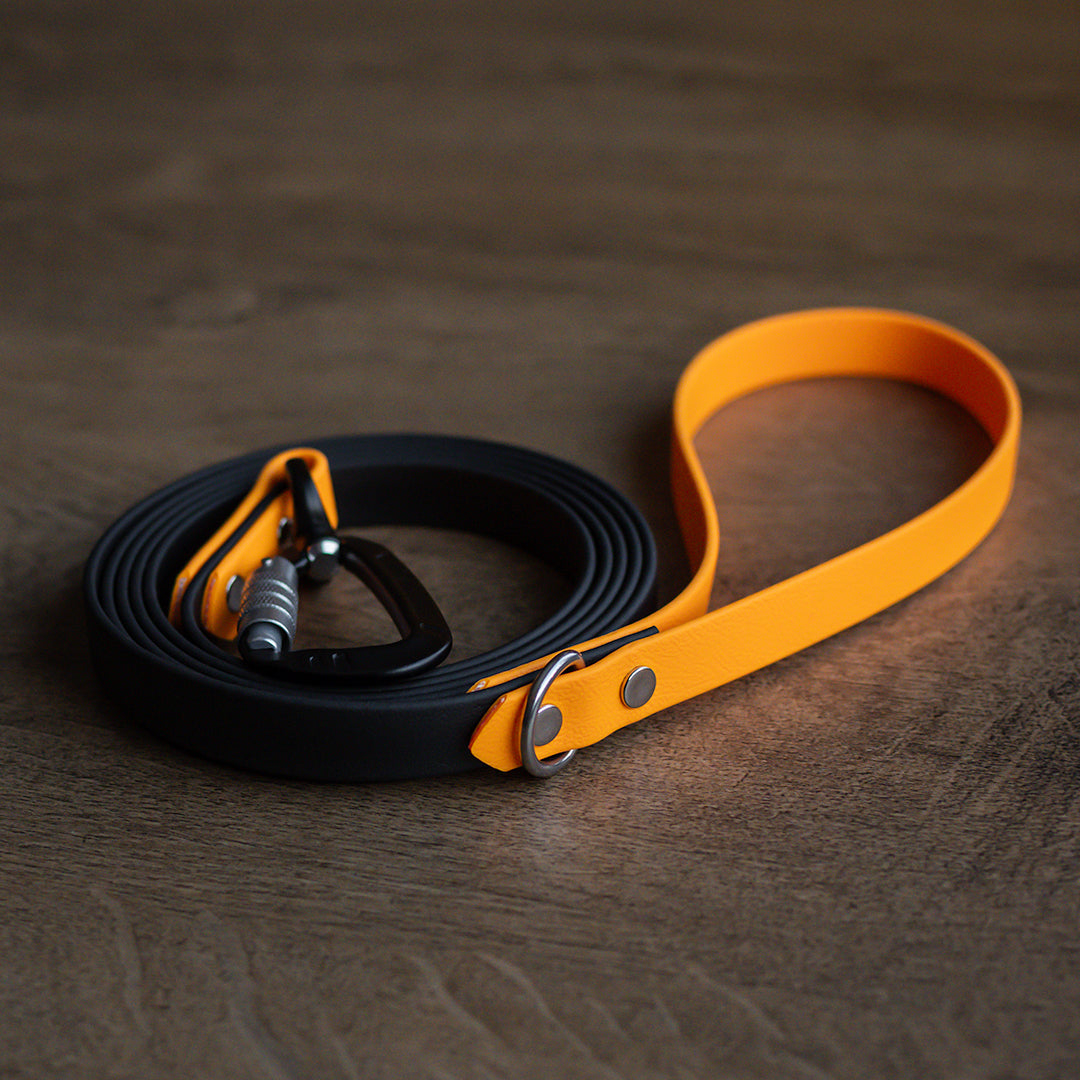 16mm Tofarget kobbel av BioThane® - Oransje og Svart